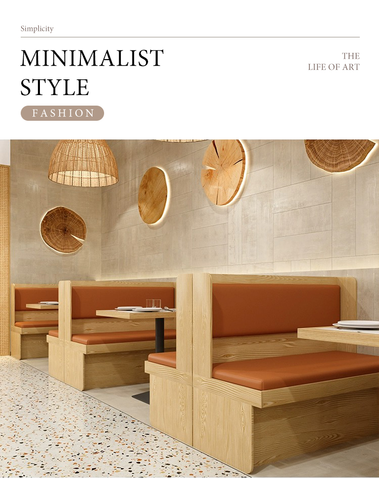 Minimalist booth seating featuring natural wood finishes and warm brown cushions. 