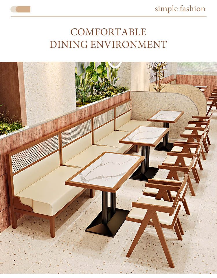 Comfortable dining furniture set with marble tables, wooden booth seating, and matching wooden chairs, creating a cozy and stylish dining atmosphere