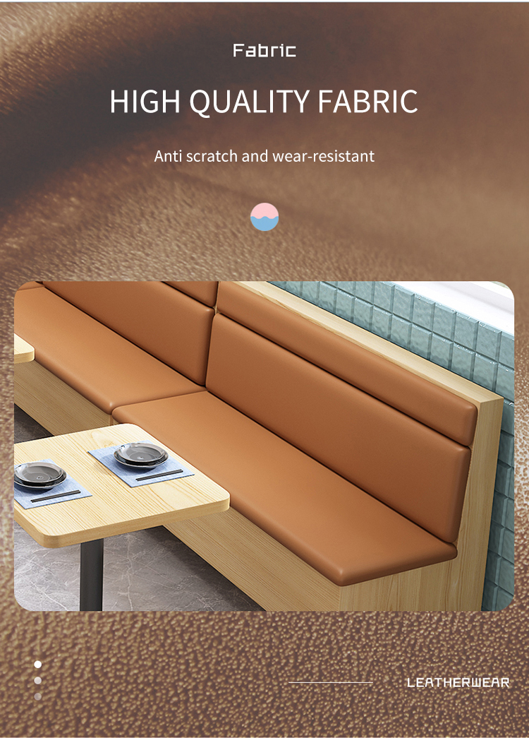 Close-up of a modern restaurant booth with orange leather cushions, showcasing high-quality, durable, and wear-resistant leather material. 