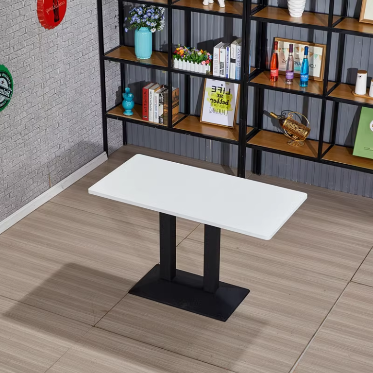 White square table with pyramid base, 60x60 cm dimensions, featuring sleek modern design for dining or café use.
