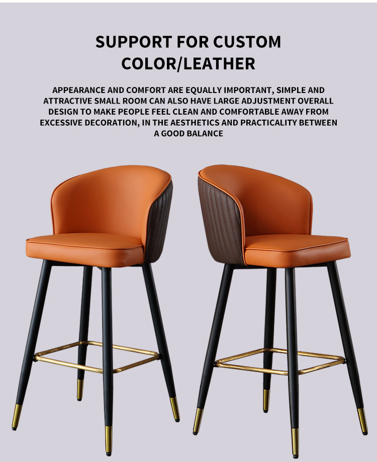 Modern bar stool with orange and black leather seat, black legs, and gold footrests. 