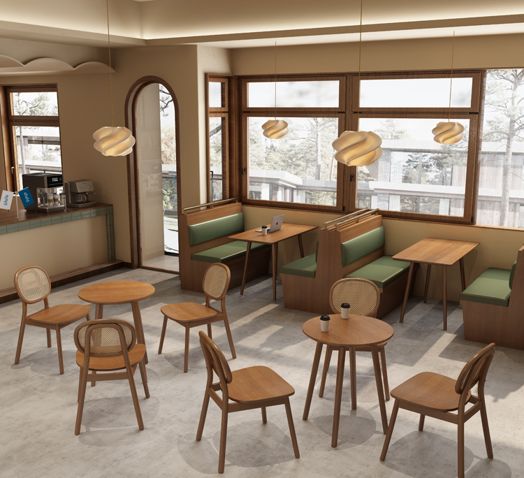 Cozy modern café interior featuring wooden tables, green booth seating, and woven chairs with stylish hanging lights.
